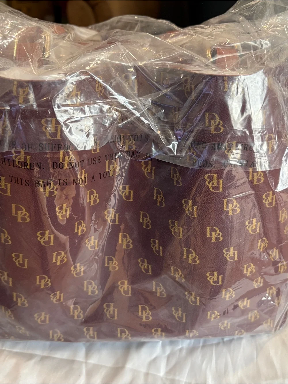 Dooney & Bourke Brown Leather Satchel with Gold Hardware